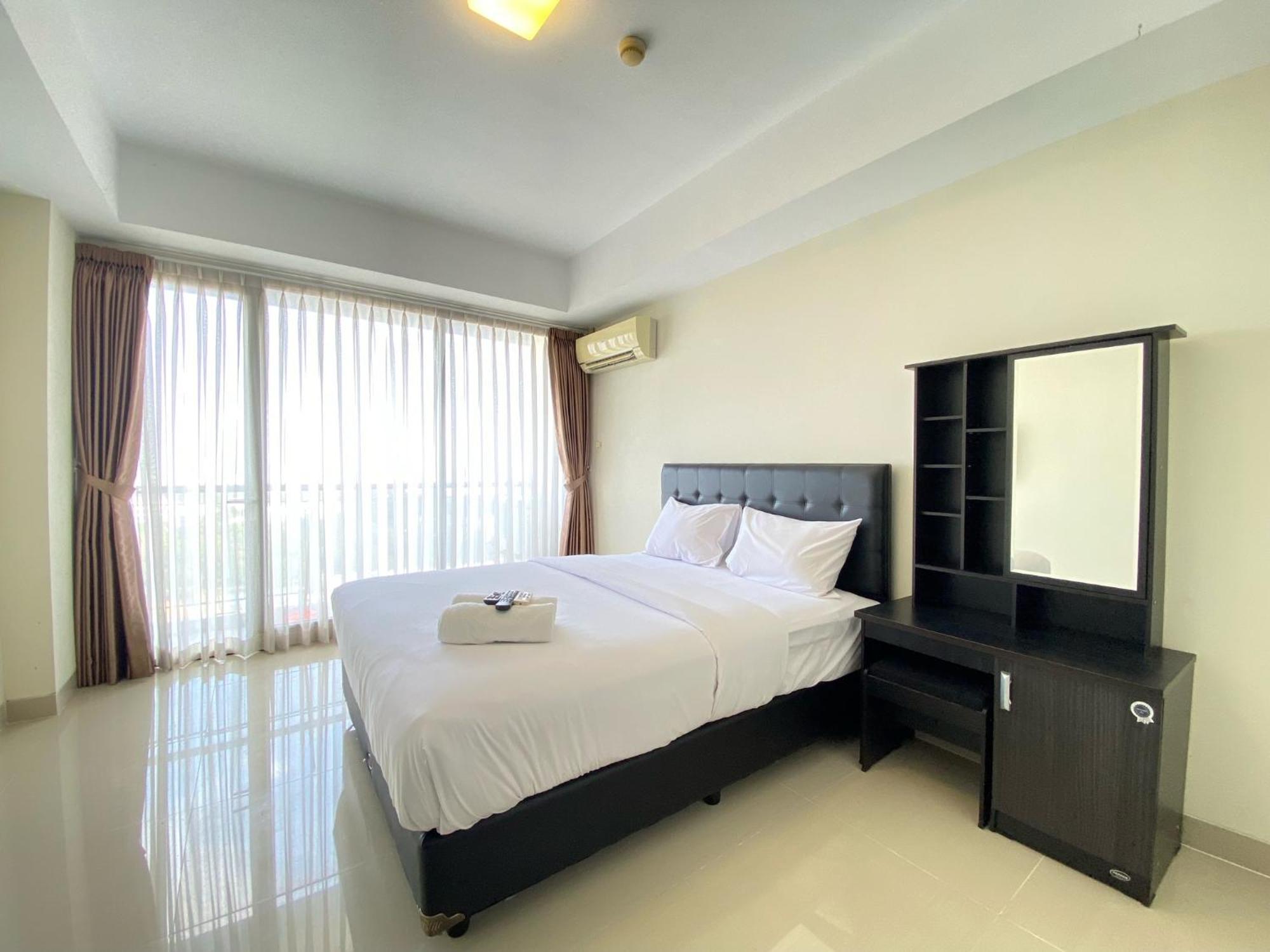 Cozy At Beverly Dago By Travelio Apartemen *